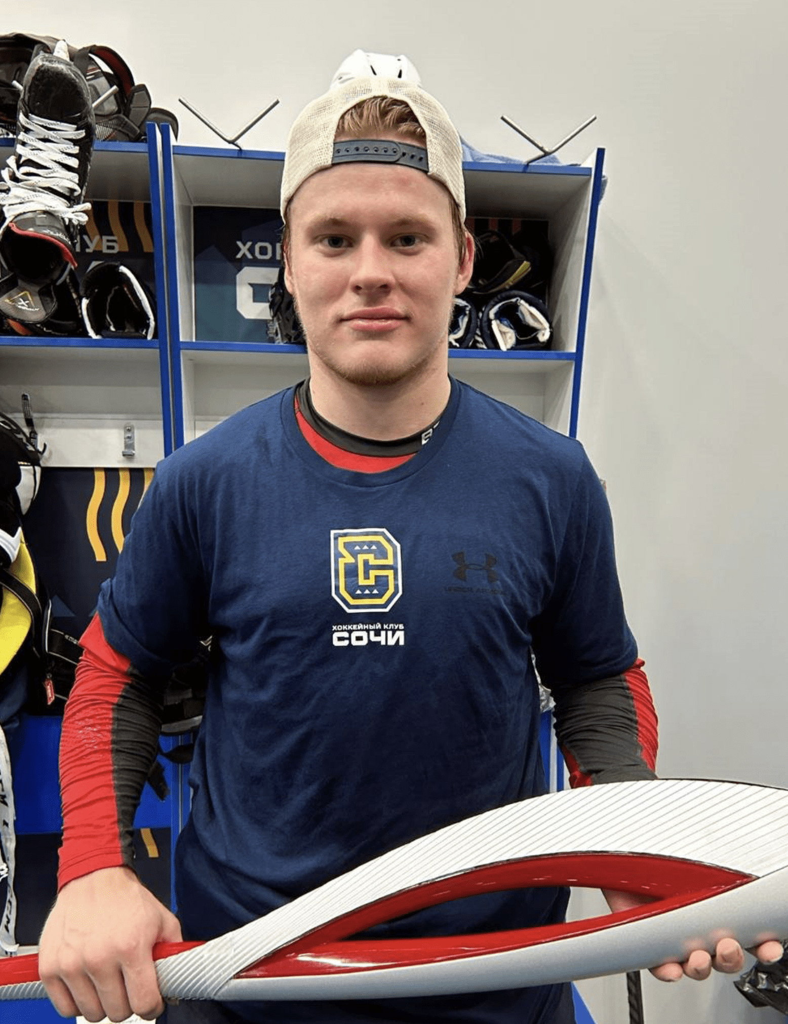 Matvei Michkov, Philadelphia Flyers, named player of the game, with torch from Sochi Olympics (Photo from @hockeynewshub Twitter feed)