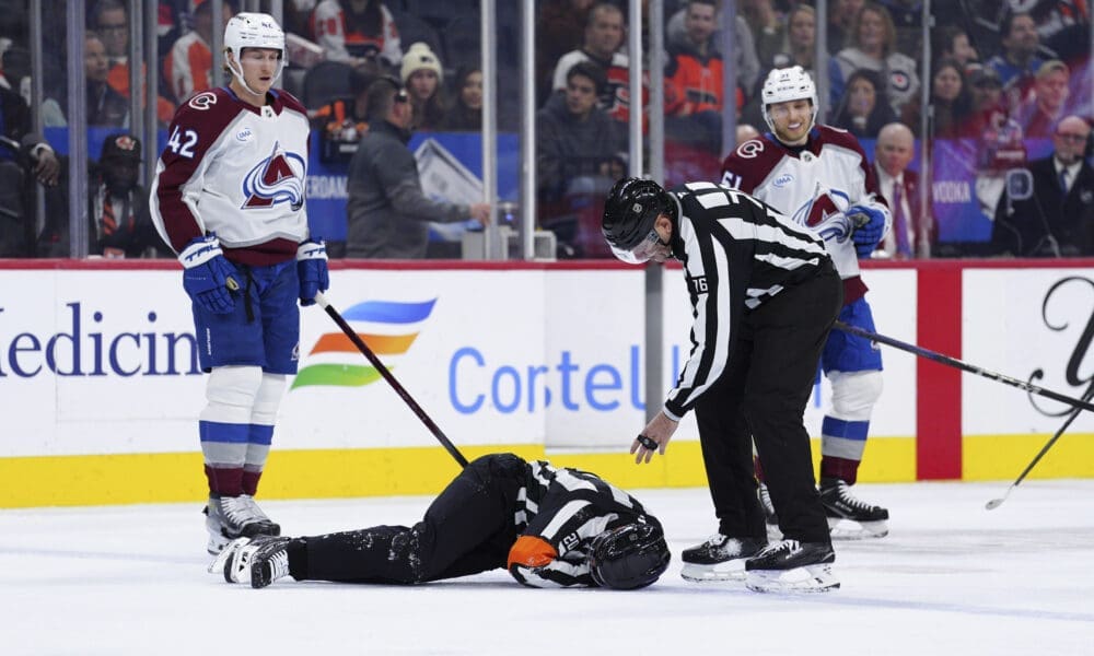 NHL referee Mitch Dunning injured on the ice