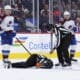 NHL referee Mitch Dunning injured on the ice