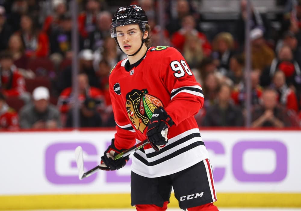 CHICAGO, IL - NOVEMBER 19: Connor Bedard #98 of the Chicago Blackhawks looks on during the first period against the Buffalo Sabres at the United Center on November 19, 2023 in Chicago, Illinois. (Photo by Melissa Tamez/Icon Sportswire)