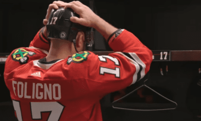 Nick Foligno gets ready in the locker room for the Chicago Blackhawks game.