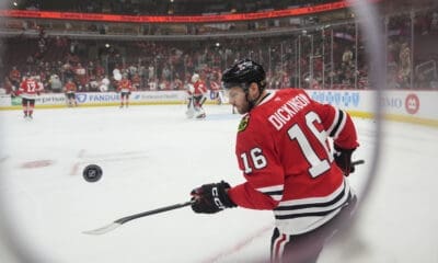 Chicago Blackhawks center Jason Dickinson warms up before an NHL hockey game against the Detroit Red Wings, Wednesday, Nov. 6, 2024, in Chicago. (AP Photo/Erin Hooley)