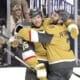 Vegas Golden Knights defenseman Noah Hanifin (15) celebrates with Vegas Golden Knights defenseman Alex Pietrangelo (7) after scoring a goal against the Montreal Canadiens during the first period of an NHL hockey game Tuesday, Dec. 31, 2024, in Las Vegas. (Steve Marcus/Las Vegas Sun via AP)