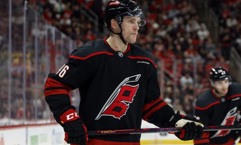 Carolina Hurricanes' Mikko Rantanen (96) waits for a face-off against the Chicago Blackhawks during the second period of an NHL hockey game in Raleigh, N.C., Sunday, Feb. 2, 2025. (AP Photo/Karl DeBlaker)