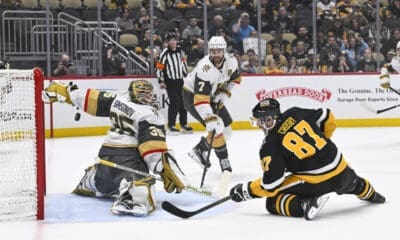 PITTSBURGH, PA - MARCH 11: Pittsburgh Penguins center Sidney Crosby (87) scores a goal against Vegas Golden Knights goaltender Ilya Samsonov (35) during the first period in the NHL game between the Pittsburgh Penguins and the Vegas Golden Knights on March 11, 2025, at PPG Paints Arena in Pittsburgh, PA. (Photo by Jeanine Leech/Icon Sportswire)