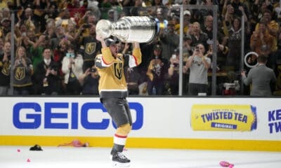 Vegas Golden Knights right wing Reilly Smith skates with the Stanley Cup after the Knights defeated the Florida Panthers 9-3 in Game 5 of the NHL hockey Stanley Cup Finals Tuesday, June 13, 2023, in Las Vegas. The Knights won the series 4-1. (AP Photo/John Locher)