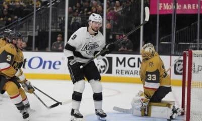 Los Angeles Kings right wing Adrian Kempe (9) scores against Vegas Golden Knights goaltender Adin Hill (33) during the third period of an NHL hockey game Sunday, March 9, 2025, in Las Vegas. (AP Photo/John Locher)