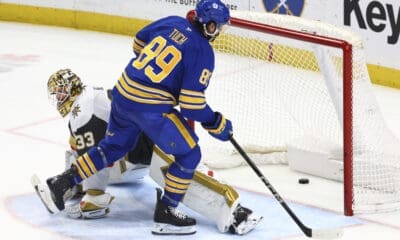 Buffalo Sabres right wing Alex Tuch (89) puts the puck past Vegas Golden Knights goaltender Adin Hill (33) for the game winning goal during a shootout in an NHL hockey game Saturday, March 15, 2025, in Buffalo, N.Y. (AP Photo/Jeffrey T. Barnes)