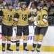 Vegas Golden Knights defenseman Noah Hanifin (15), left wing Pavel Dorofeyev (16), center Jack Eichel (9) and center Tomas Hertl (48) celebrate after Dorofeyev's first goal during the second period of an NHL hockey game against the Boston Bruins Thursday, March 20, 2025, in Las Vegas. (AP Photo/Ian Maule)