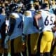 The Steelers offense huddles up as they played against the Carolina Panthers on Sunday, Dec. 18, 2022 at Bank of America Stadium in Charlotte. (Mitchell Northam / Steelers Now)