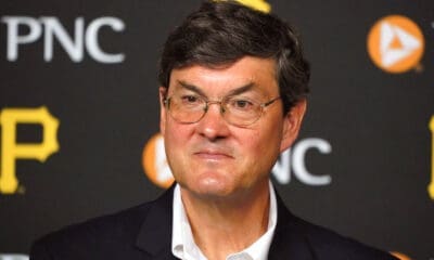 Bob Nutting, owner of the Pittsburgh Pirates of Major League Baseball, listens to a question from the media after signing third baseman Ke'Bryan Hayes to an eight-year contract extension through the 2029 season with a club option for 2030, before the home season opening baseball game against the Chicago Cubs in Pittsburgh, April 12, 2022. (AP Photo/Gene J. Puskar)