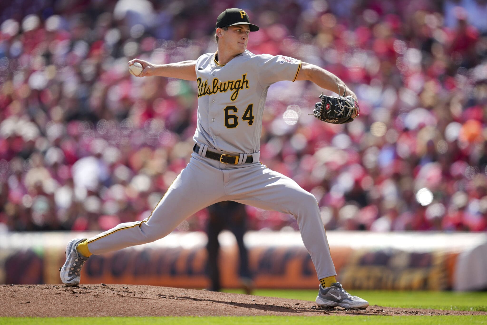 Pittsburgh Pirates' Quinn Priester throws during the first inning of a baseball game against the Cincinnati Reds in Cincinnati, Sunday, Sept. 24, 2023. (AP Photo/Aaron Doster)