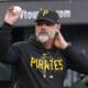 Pittsburgh Pirates manager Derek Shelton tosses a foul ball to a fan during the first inning of the team's baseball game against the Washington Nationals in Pittsburgh, Wednesday, Sept. 13, 2023. (AP Photo/Gene J. Puskar)