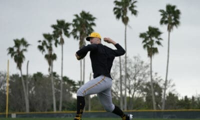 Pittsburgh Pirates pitcher Paul Skenes throws during a baseball spring training workout Saturday, Feb. 17, 2024, in Bradenton, Fla. (AP Photo/Charlie Neibergall)