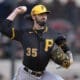 Pittsburgh Pirates relief pitcher Colin Holderman (35) throws during the fourth inning of a spring training baseball game against the Detroit Tigers Saturday, March 2, 2024, in Lakeland, Fla. (AP Photo/Charlie Neibergall)