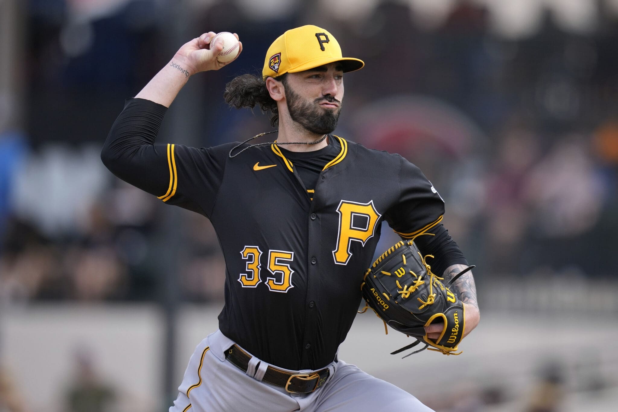 Pittsburgh Pirates relief pitcher Colin Holderman (35) throws during the fourth inning of a spring training baseball game against the Detroit Tigers Saturday, March 2, 2024, in Lakeland, Fla. (AP Photo/Charlie Neibergall)