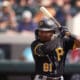 Pittsburgh Pirates second baseman Termarr Johnson bats during the seventh inning of a spring training baseball game against the Detroit Tigers Saturday, March 9, 2024, in Lakeland, Fla. (AP Photo/Charlie Neibergall)