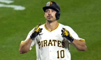 Pittsburgh Pirates' Bryan Reynolds crosses home plate after hitting a solo home run off Detroit Tigers relief pitcher Tyler Holton during the sixth inning of a baseball game in Pittsburgh, Monday, April 8, 2024. (AP Photo/Gene J. Puskar)