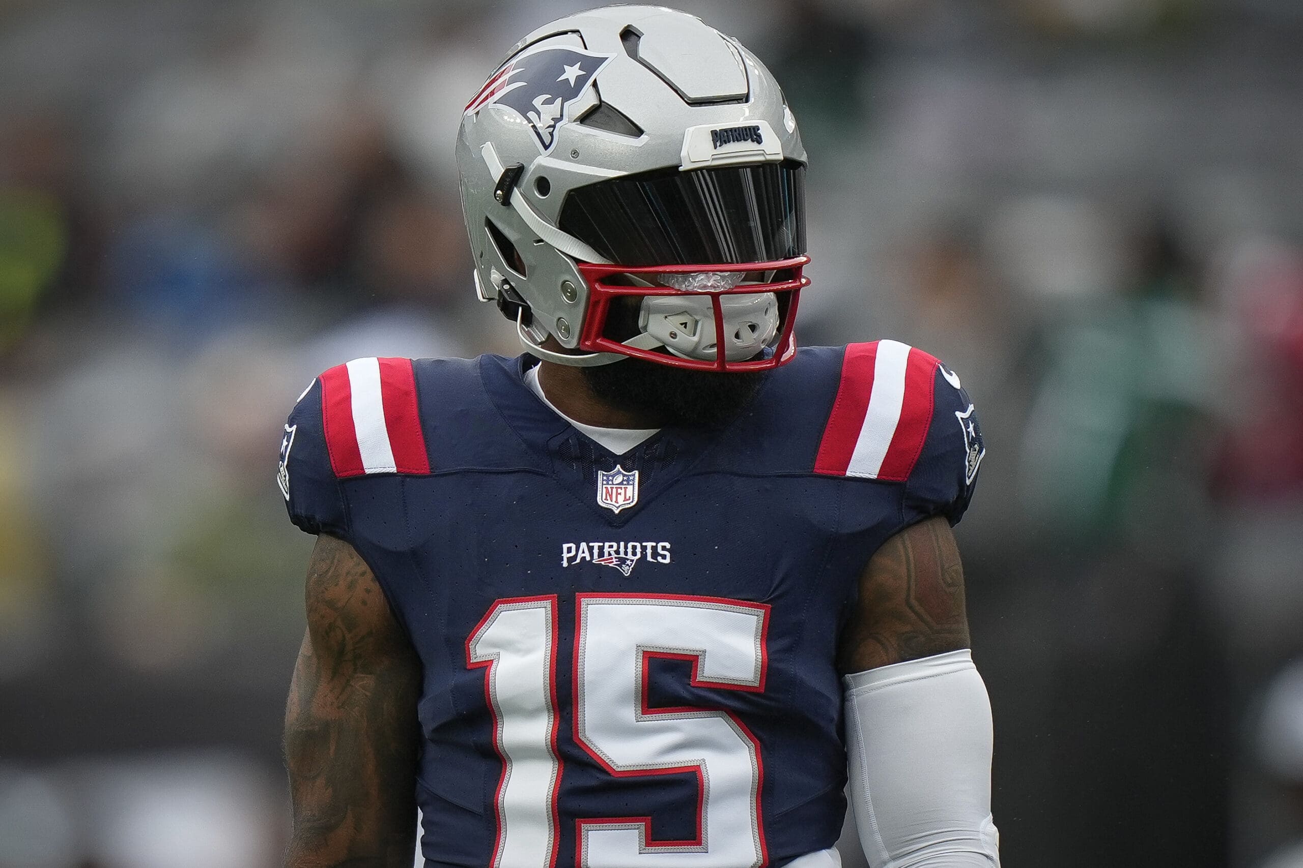 New England Patriots running back Ezekiel Elliott (15) warms up before an NFL football game against the New York Jets on Sunday Sept. 24, 2023, in New York. (AP Photo/Bryan Woolston)