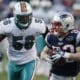 New England Patriots WR Wes Welker runs away from the Miami Dolphins defender