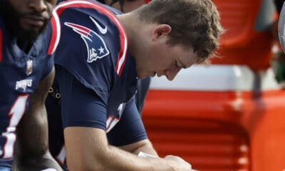New England Patriots quarterback hangs his head during Sunday's loss to the New Orleans Saints