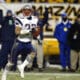 New England Patriots' Rodney Harrison returns an interception 87 yards for a touchdown in the second quarter of the AFC Championship game against the Pittsburgh Steelers Sunday, Jan. 23, 2005, in Pittsburgh. He is one of 25 semifinalists for the Pro Football Hall of Fame Class of 2024. (AP Photo/Stephan Savoia)