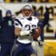 New England Patriots' Rodney Harrison returns an interception 87 yards for a touchdown in the second quarter of the AFC Championship game against the Pittsburgh Steelers Sunday, Jan. 23, 2005, in Pittsburgh. He is one of 25 semifinalists for the Pro Football Hall of Fame Class of 2024. (AP Photo/Stephan Savoia)