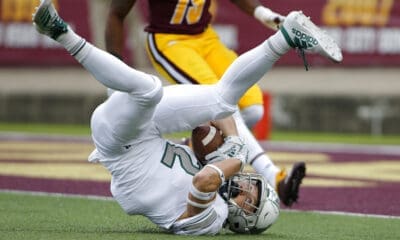 Eastern Michigan receiver Mathew Sexton tumbles after catching a pass against Central Michigan during an NCAA football game on Saturday, Oct. 5, 2019, in Mount Pleasant, Mich. (AP Photo/Al Goldis)