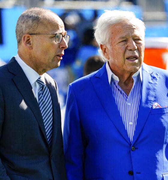 President of the New England Patriots Jonathan Kraft, left, looks on with owner Robert Kraft, right, before the first half of an NFL football game between the Carolina Panthers and the New England Patriots Sunday, Nov. 7, 2021, in Charlotte, N.C. The Krafts will need to decide on the future of Patriots head coach Bill Belichick. (AP Photo/Jacob Kupferman)