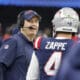 New England Patriots offensive coordinator Bill O'Brien, left, talks to quarterback Bailey Zappe (4) during an NFL Football game in Arlington, Texas, Sunday, Nov. 1, 2023. (AP Photo/Michael Ainsworth)