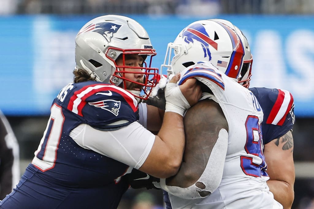 New England Patriots center David Andrews blocks against the Buffalo Bills during the second half of an NFL football game, Sunday, Oct. 22, 2023, in Foxborough, Mass. (AP Photo/Winslow Townson)