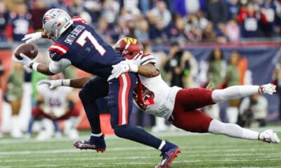 New England Patriots wide received JuJu Smith-Schuster attempts to bring in a pass from Mac Jones