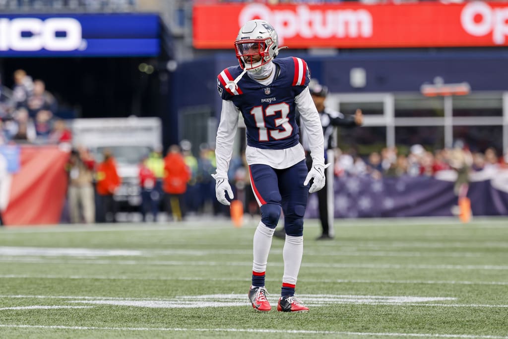 New England Patriots cornerback Jack Jones (13) drops into coverage during the first half of an NFL football game against the Washington Commanders on Sunday, Nov. 5, 2023, in Foxborough, Mass. (AP Photo/Greg M. Cooper)