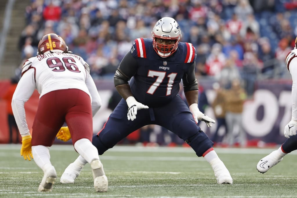 New England Patriots guard Mike Onwenu blocks against the Washington Commanders during an NFL football game at Gillette Stadium, Sunday Nov. 5, 2023 in Foxborough, Mass. Onwenu should be the Patriots top priority in NFL free agency. (Winslow Townson/AP Images for Panini)