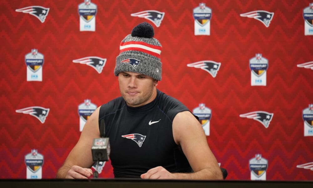 New England Patriots tight end Hunter Henry speaks during a press conference after an NFL football game against the Indianapolis Colts in Frankfurt, Germany Sunday, Nov. 12, 2023. The Colts won 10-6. (AP Photo/Martin Meissner)