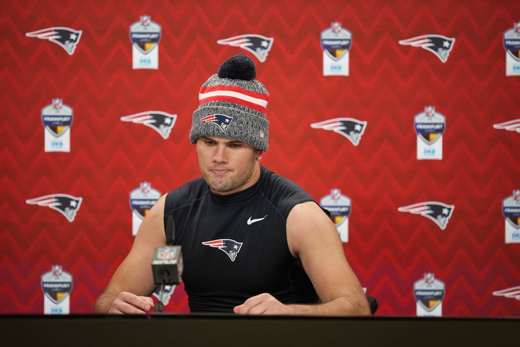 New England Patriots tight end Hunter Henry speaks during a press conference after an NFL football game against the Indianapolis Colts in Frankfurt, Germany Sunday, Nov. 12, 2023. The Colts won 10-6. (AP Photo/Martin Meissner)