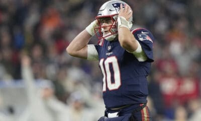 New England Patriots quarterback Mac Jones (10) reacts after throwing an interception during an NFL football game between the New England Patriots and the Indianapolis Colts at Deutsche Bank Park Stadium in Frankfurt, Germany, Sunday, Nov. 12, 2023. (AP Photo/Steve Luciano)