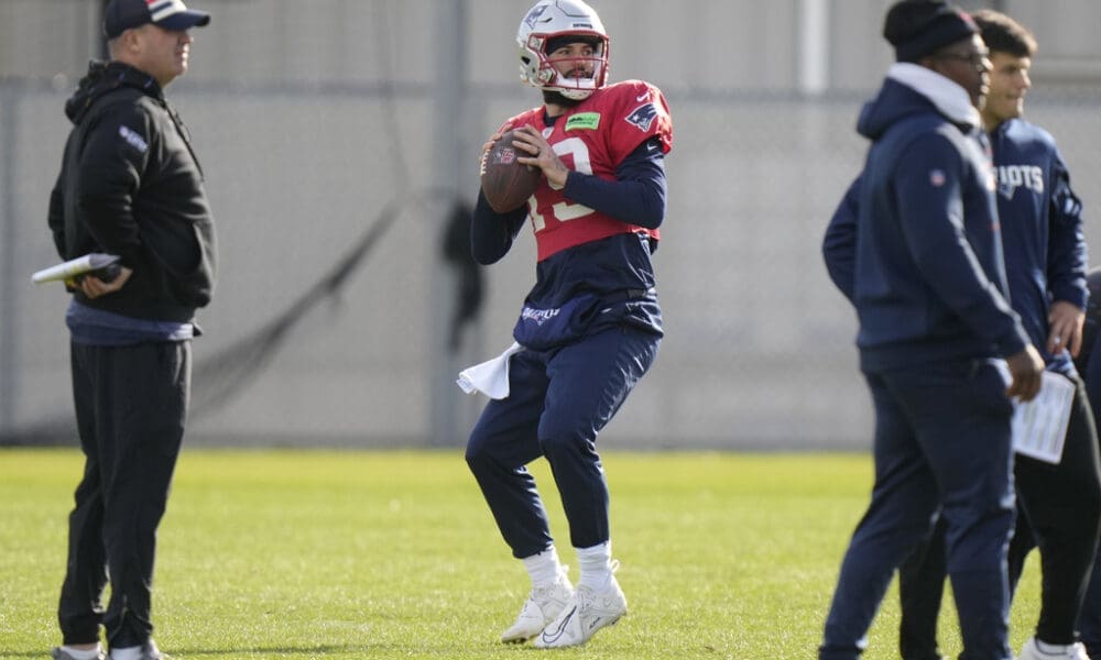 New England Patriots quarterback Will Grier (19) looks to pass during an NFL football practice, Wednesday, Nov. 15, 2023, in Foxborough, Mass. (AP Photo/Steven Senne)