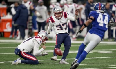 New England Patriots place kicker Chad Ryland (37) kicks an extra point against the New York Giants during the third quarter of an NFL football game, Sunday, Nov. 26, 2023, in East Rutherford, N.J. (AP Photo/Seth Wenig)