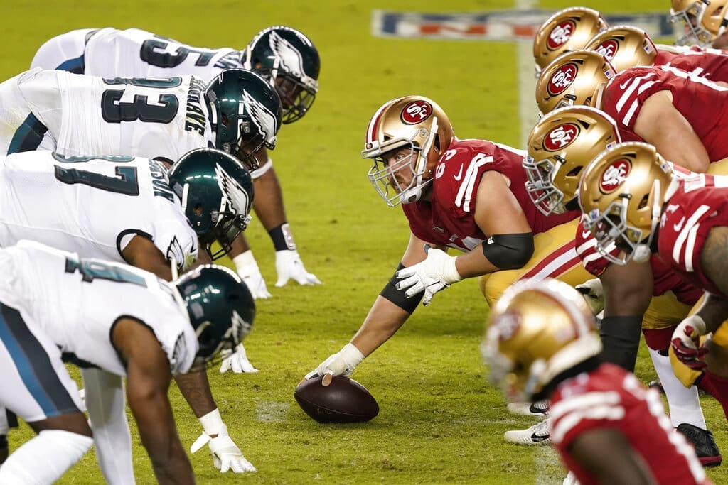 San Francisco 49ers center Ben Garland (63) prepares to snap the ball at the line of scrimmage against the Philadelphia Eagles during an NFL football game in Santa Clara, Calif., Sunday, Oct. 4, 2020. (AP Photo/Tony Avelar)