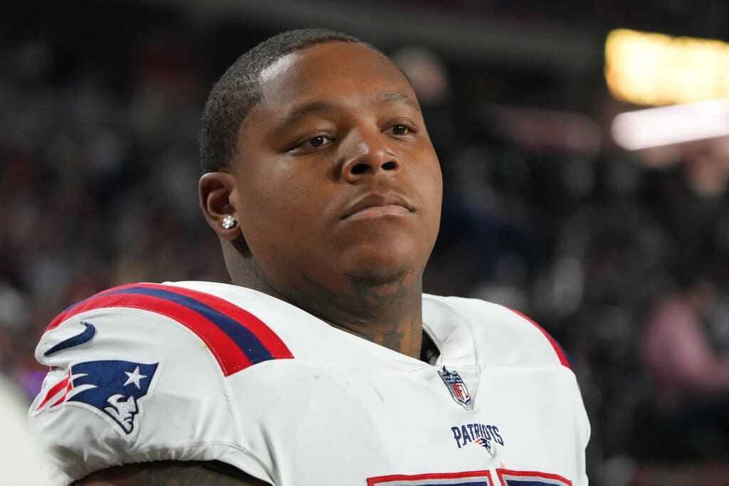 New England Patriots offensive tackle Trent Brown (77) warms up before an NFL football game against the Arizona Cardinals, Monday, Dec. 12, 2022, in Glendale, Ariz. (AP Photo/Rick Scuteri)