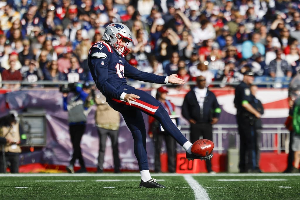 New England Patriots punter Bryce Baringer (17) punts the ball during the first half of an NFL football game Washington Commanders on Sunday, Nov. 5, 2023, in Foxborough, Mass. (AP Photo/Greg M. Cooper)
