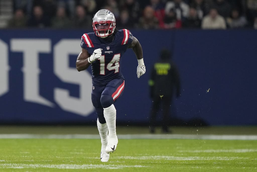 New England Patriots wide receiver Ty Montgomery II (14) runs up the field during an NFL football game between the New England Patriots and the Indianapolis Colts at Deutsche Bank Park Stadium in Frankfurt, Germany, Sunday, Nov. 12, 2023. (AP Photo/Steve Luciano)