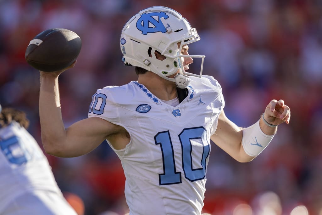 North Carolina quarterback Drake Maye (10) passes against Clemson during an NCAA college football game Saturday, Nov. 18, 2023, in Clemson, S.C. Maye is projected to go to the New England Patriots in the first 2024 NFL Mock Draft on PFN. (AP Photo/Jacob Kupferman)