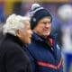 New England Patriots head coach Bill Belichick meets with Patriots owner Robert Kraft, left, before an NFL football game against the Buffalo Bills, Sunday, Jan. 8, 2023, in Orchard Park, N.Y. (AP Photo/Adrian Kraus)