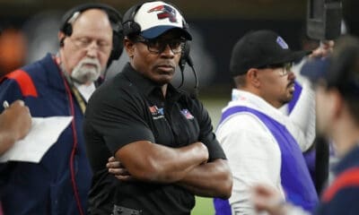West head coach and New England Patriots wide receiver and kickoff returners coach Troy Brown watches before the East-West Shrine Bowl NCAA college football game Thursday, Feb. 2, 2023, in Las Vegas. (AP Photo/John Locher)