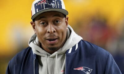 New England Patriots defensive line coach DeMarcus Covington stands on the sidelines before an NFL football game against the Pittsburgh Steelers Thursday, Dec. 7, 2023, in Pittsburgh. (AP Photo/Matt Freed)