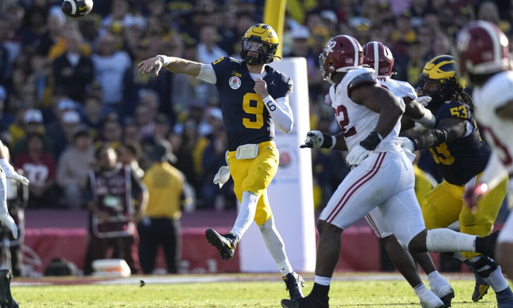 Michigan quarterback J.J. McCarthy (9) throws a pass during the first half of the Rose Bowl CFP NCAA semifinal college football game against Alabama Monday, Jan. 1, 2024, in Pasadena, Calif. McCarthy is one of the quarterbacks under consideration for the Patriots in the 2024 NFL Draft. (AP Photo/Mark J. Terrill)