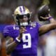 NFL Draft prospect, Washington quarterback Michael Penix Jr. warms up before an NCAA college football game Monday, Jan. 1, 2024, in New Orleans. (AP Photo/Butch Dill)