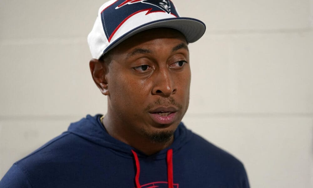 New England Patriots defensive coordinator, then the defensive line coach, DeMarcus Covington faces reporters, Monday, Aug. 29, 2022, at the NFL football team's stadium, in Foxborough, Mass. (AP Photo/Steven Senne)